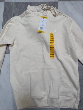 Champion Cream Drawstring Hoodie with Subtle Logo